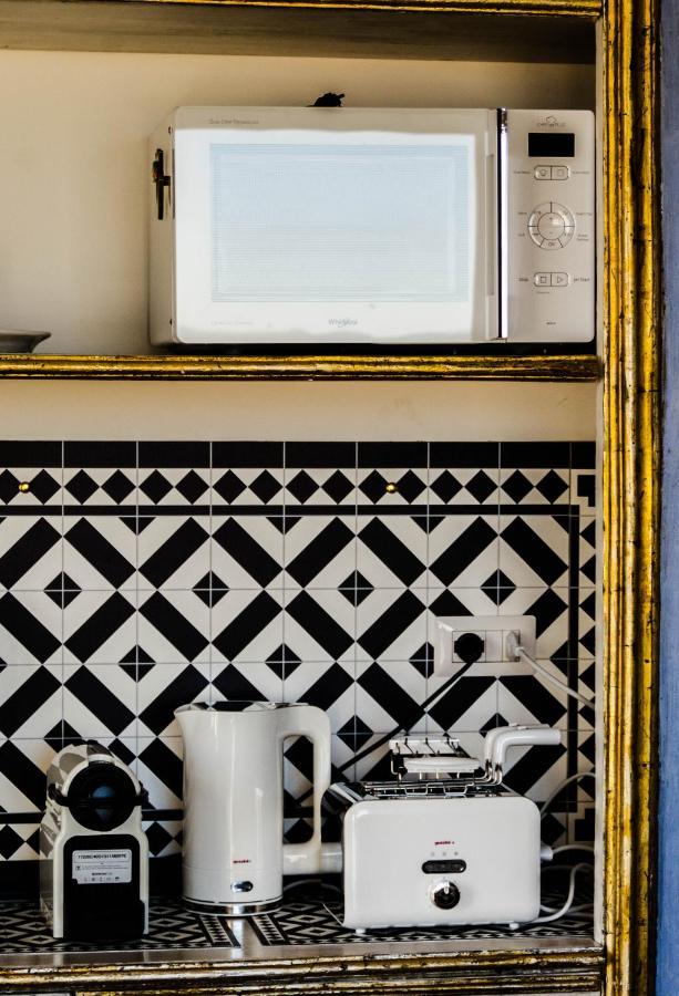 Eleventh Floor Suites Кальяри Экстерьер фото